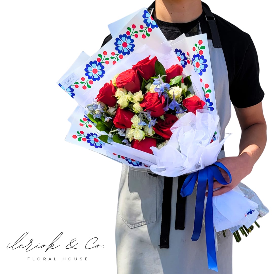 Cemille Bouquet - Inspired by the abundant love from a little corner in the Mediterranean Sea.  Red roses, white spray roses &amp; delphinium.