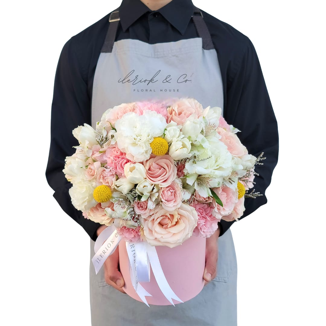 Lola Coquette Box - Our girly pink box with soft delicate flowers to show how much you care.  Pink mondial roses, lisianthus, pink carnations and white alstroemerias in a pink floral box.  Premium Box Shown