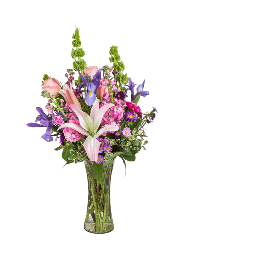 Enchanted Fairytale Enchanted Fairytale - This arrangement contains stargazer lilies, bells of ireland, stock, blue iris, roses, carnations, and purple aster. This is a great gift for birthday, Mother's Day, love and romance, or to say thank you.