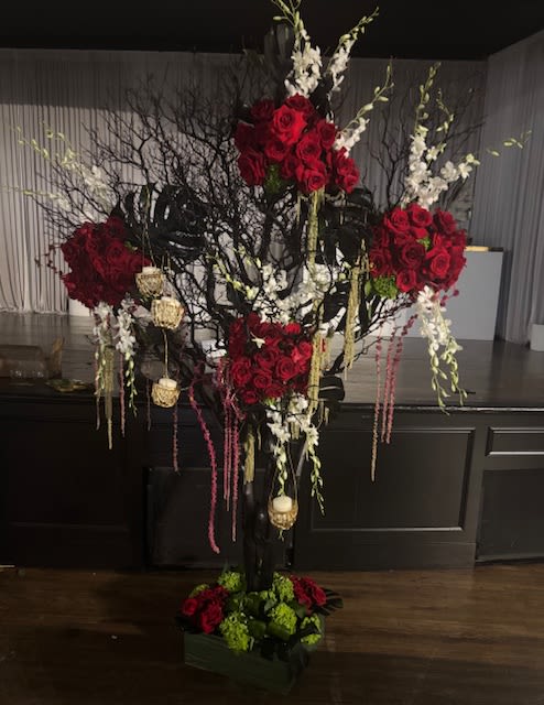 Have You Ever - A grand, stunning and tall arrangement with beautiful red roses 