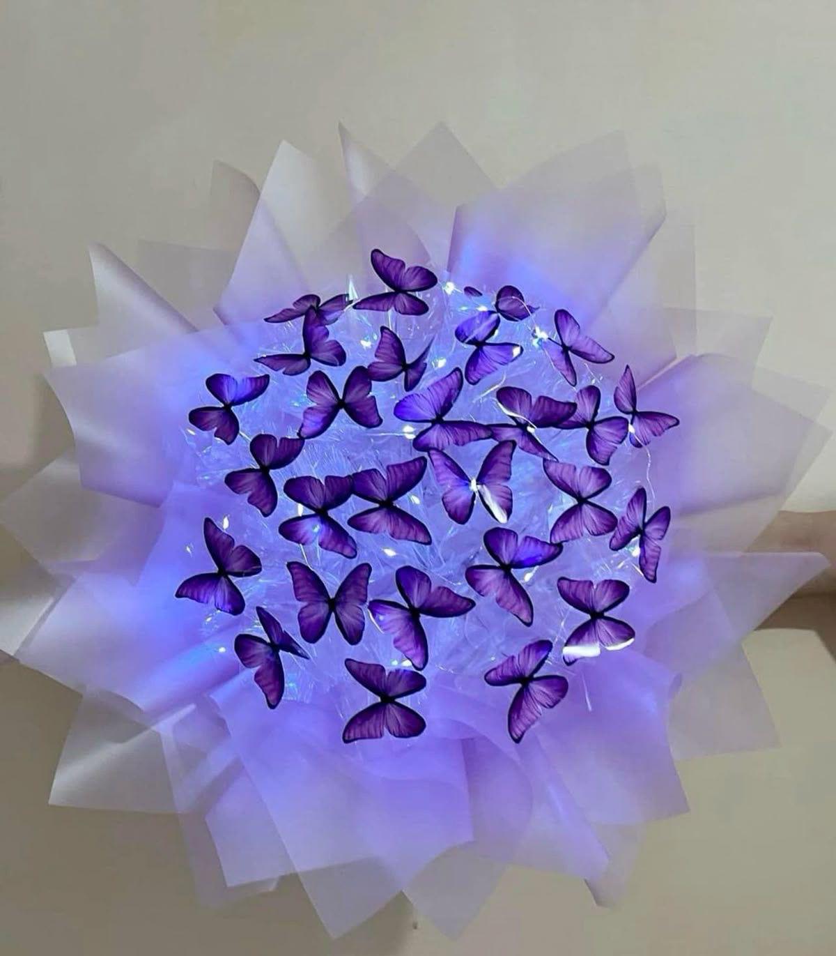 Ramo de mariposas. - Ramo buchon de mariposas elaborado con mariposas artificiales y papel especificamente para resistir. este pedido debera hacerse con 4 dias de anticipacion minimo.