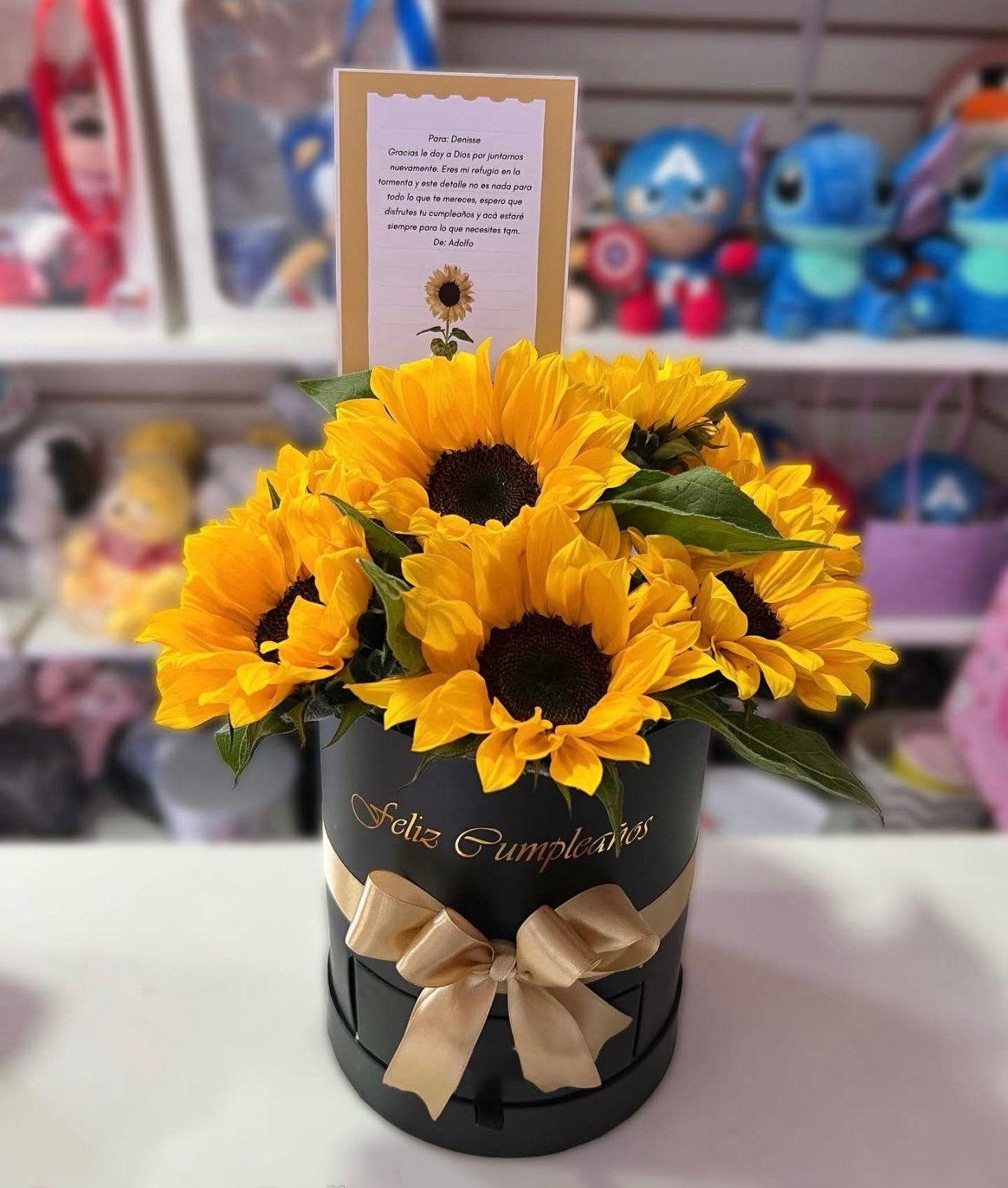 Arreglo de girasoless - Arreglo elaborado con cajita negra y girasoles.