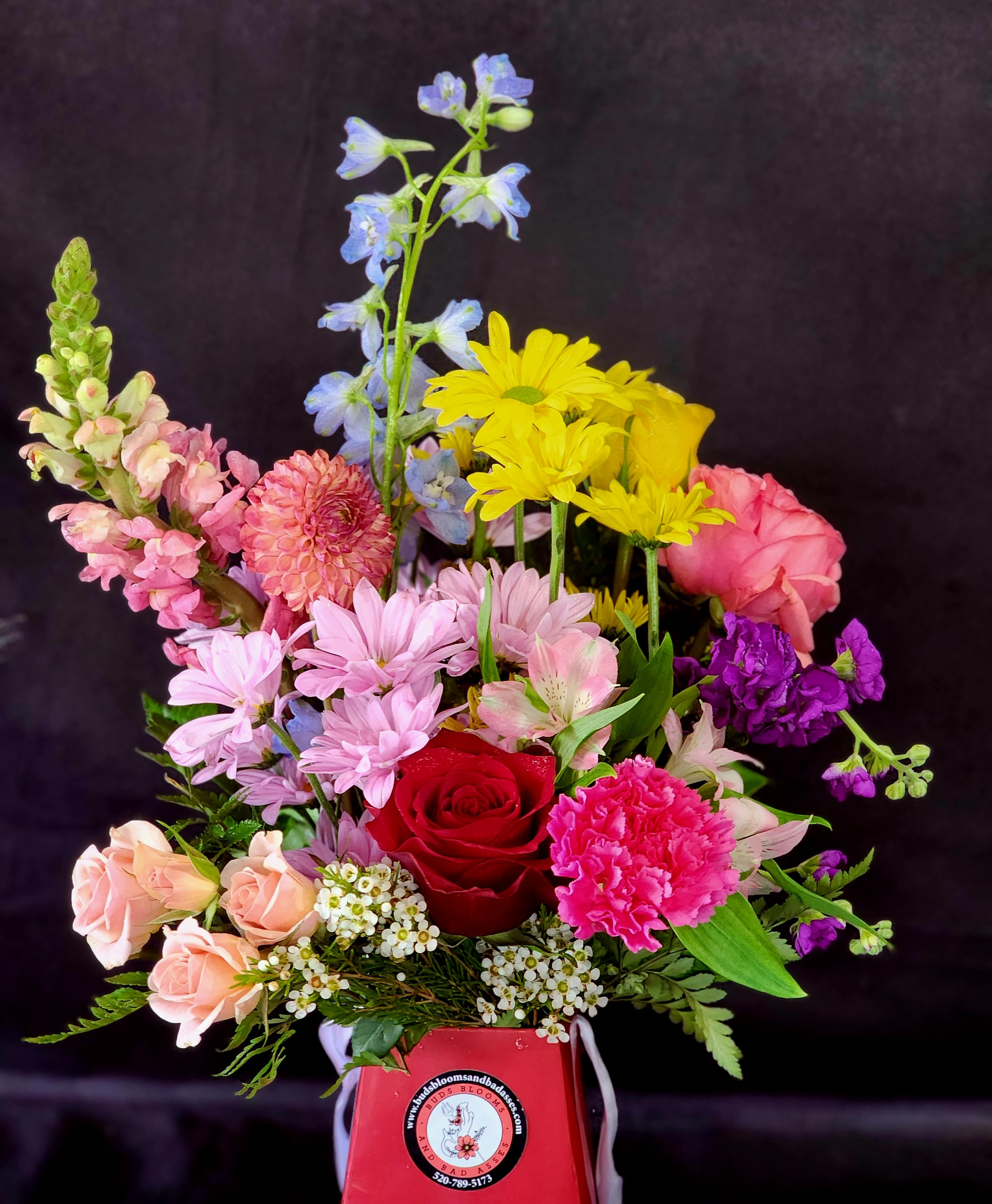Boxful of Love - Kick the glass vase to the curb and be earth friendly. Seasonal flowers in a biodegradable floral box. Roses and Lilies  are not guaranteed.