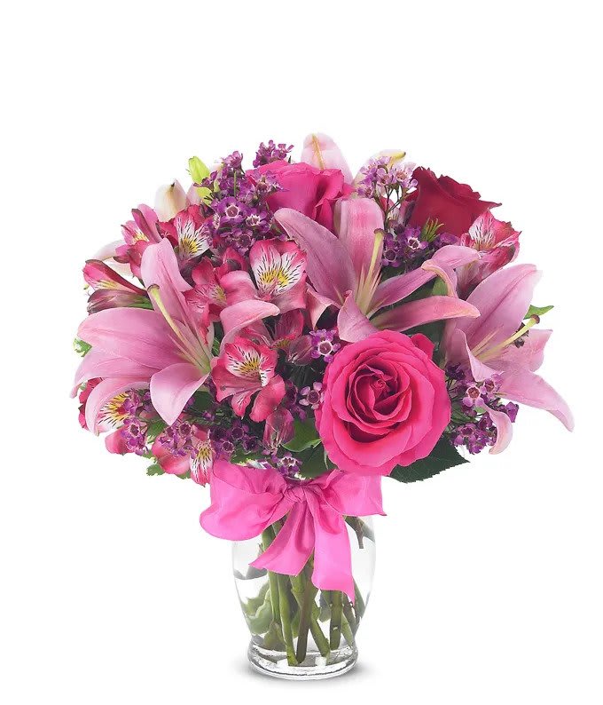 Romance Bouquet - Lilies, roses, alstroemeria with fillers &amp; a cute bow show off all the shades of pink.