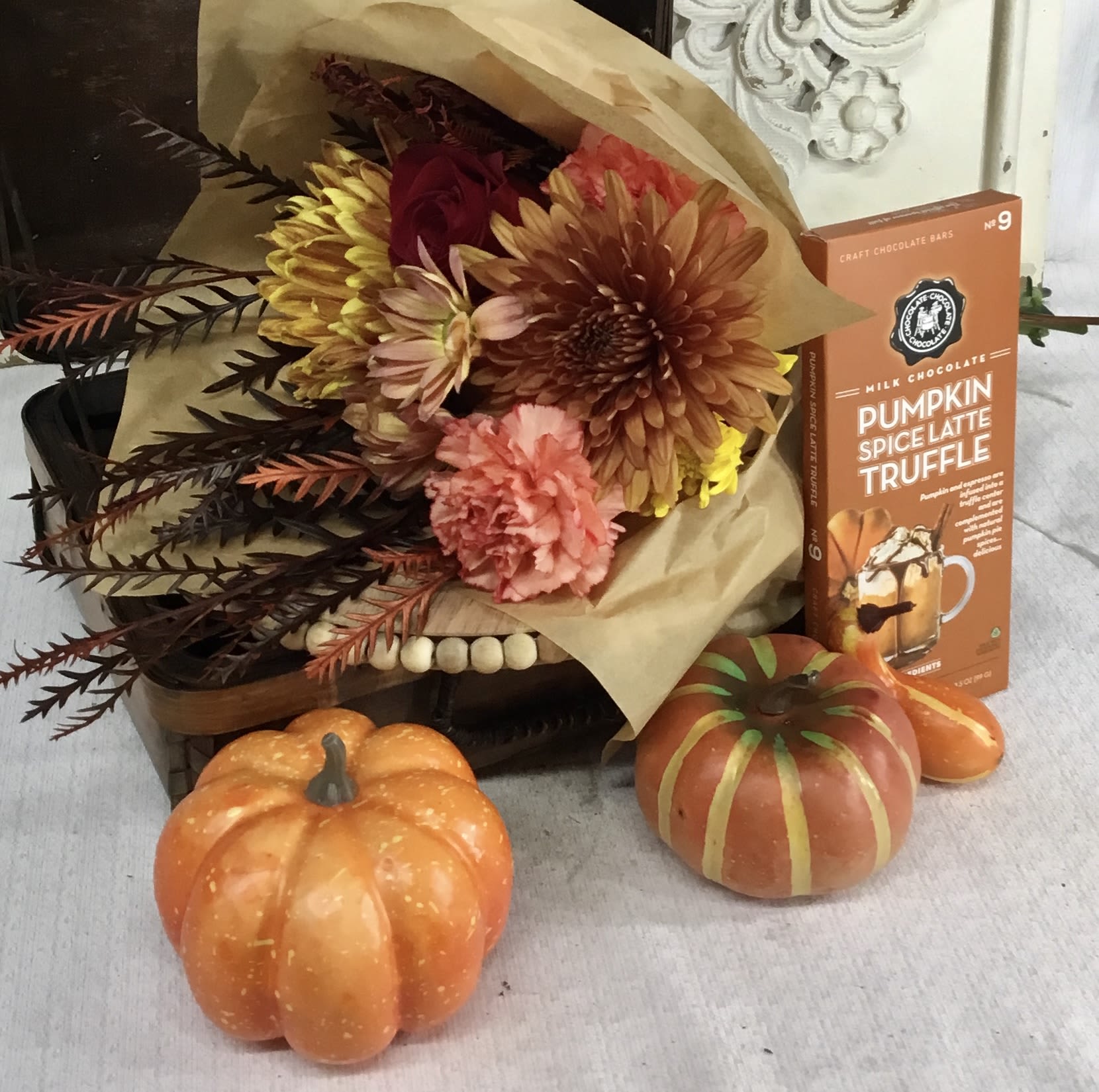 Fall For Me Fall For Me - A fall themed, hand tied bouquet with single rose. This bouquet includes a pumpkin spice latte truffle chocolate bar.
