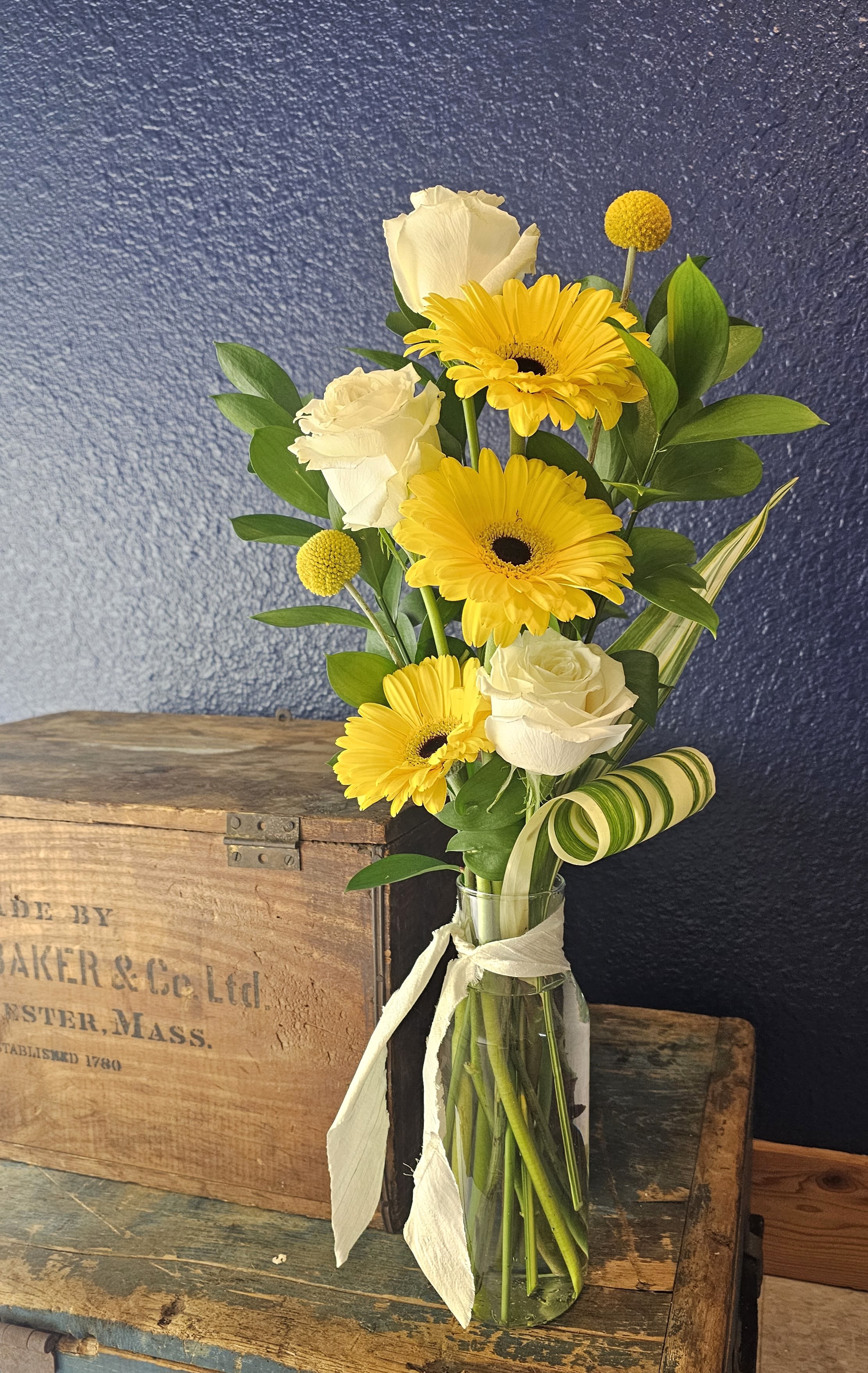 Three's a party! Three's a party! - Tall sleek bouquet with three focal blooms and some modern elements including some creatively places greens.