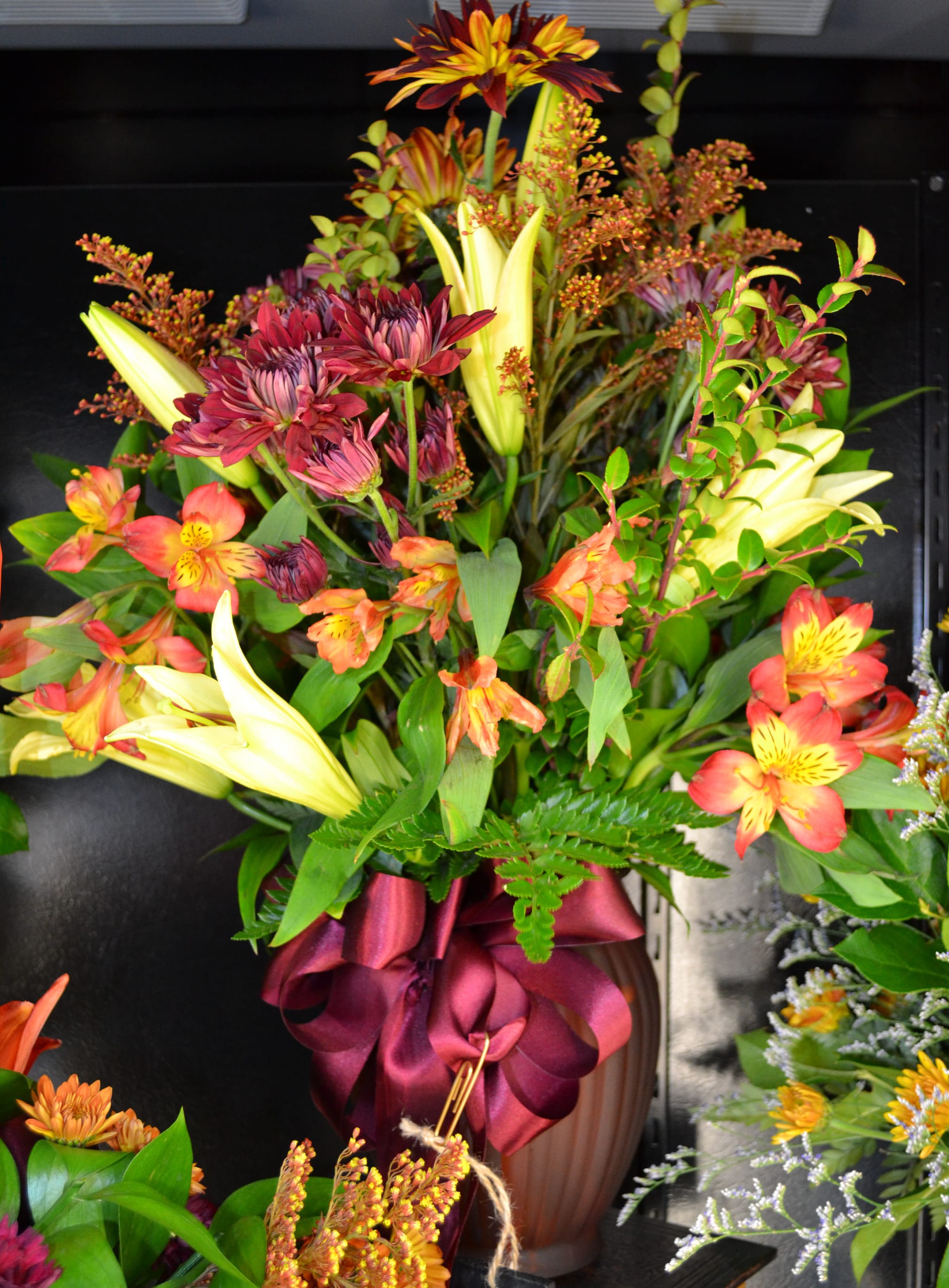 Fall Magic - Alstro, Lilies and Mums in this wonderful Thanksgiving arrangement