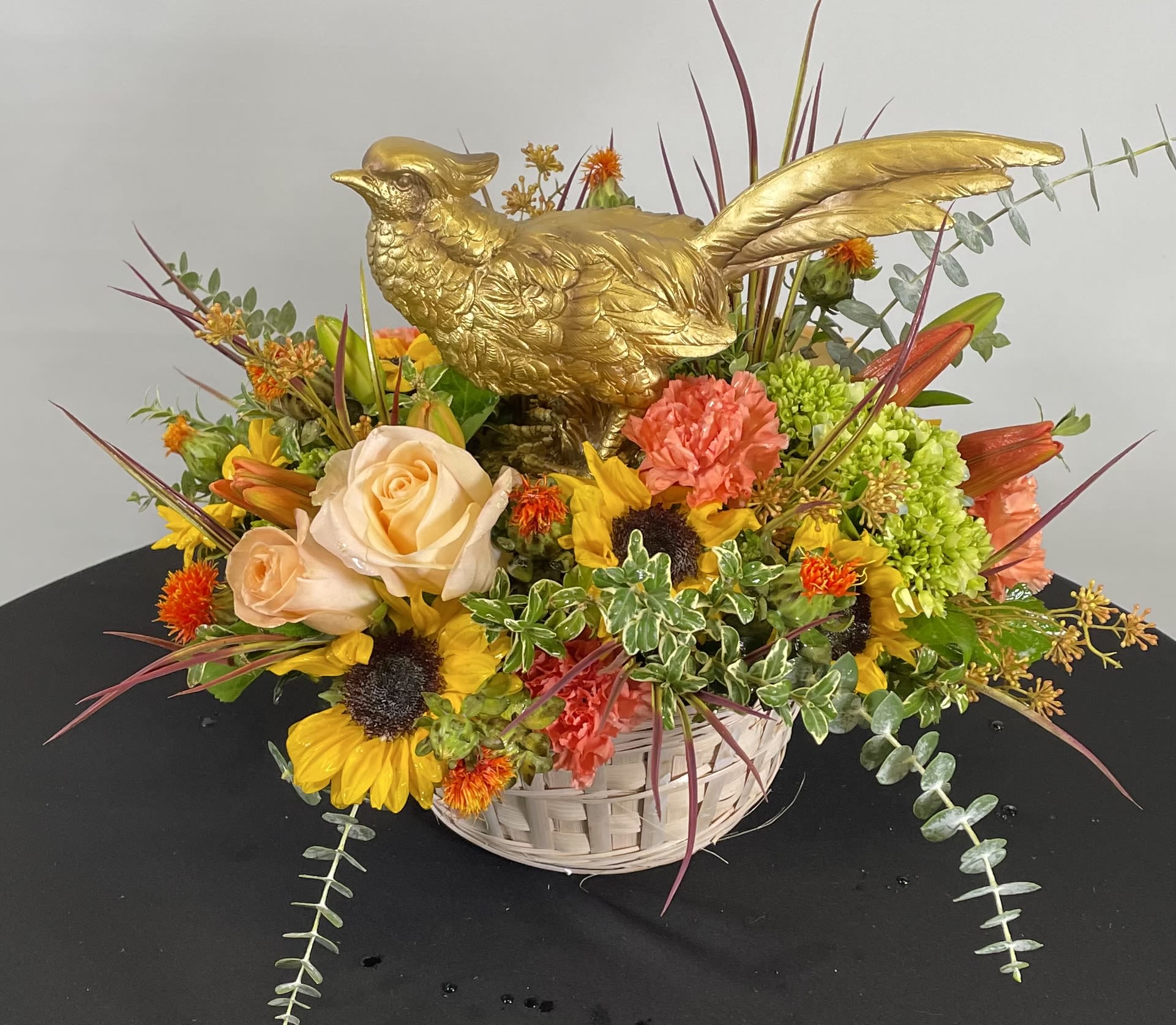 Golden Pheasant - Let us select a beautiful gift item for you such as this golden pheasant and add it to a striking arrangement.  The price will of course vary with selection.
