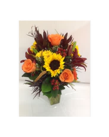 Fall Views Bouquets - What better view than the ones we have during fall?! Sunflowers, roses, hypericum berries, lilies, gerbers, daisies, safari sunset and lovely fall greenery.    Flowers and colors may be substituted depending on availability and season.    FCF-084