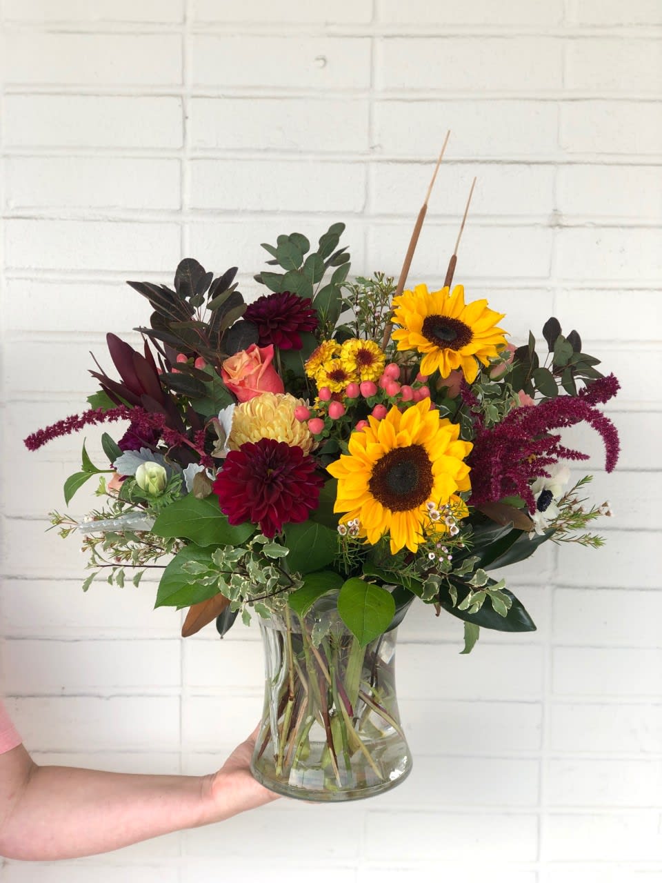 Time To Shine for FALL Bouquet - Stunning arrangement that will automatically make you have ALL the Fall feels! Beautiful and rich burgundy dahlias, safari sunset and ++++. soft butterscotch mums, buttons, orange/peach/coral roses, coral hypericum berries and the perfect touch of white anemones, waxflower, upright amaranthus and mixed greenery 