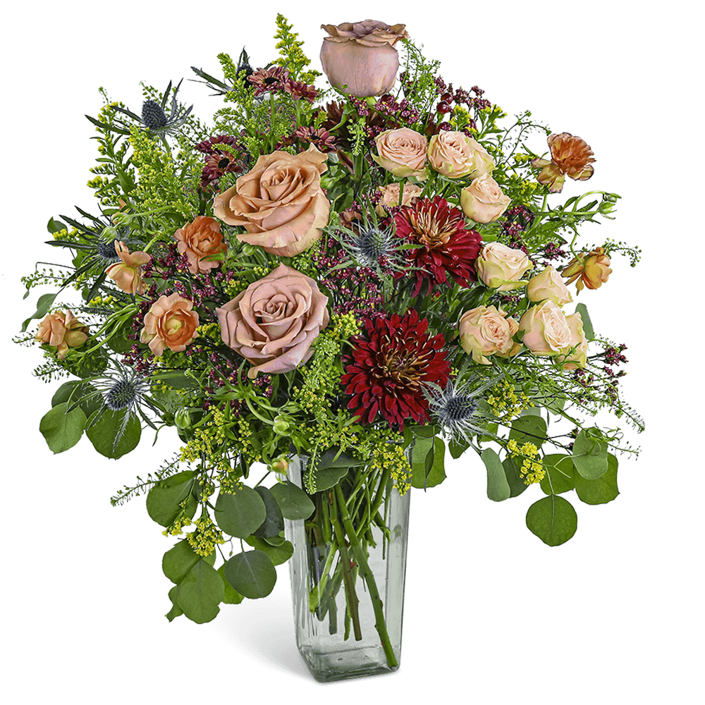 Chestnut Orchard Chestnut Orchard - Chestnut Orchard is a graceful arrangement featuring soft neutral Roses, Berries, Thistle, and seasonal accent blooms in warm autumn tones. Designed in a clear glass vase, it's perfect for birthdays, anniversaries, or thoughtful flower delivery just because. Our local florist may make tasteful substitutions to ensure freshness and maintain the beauty of the design.