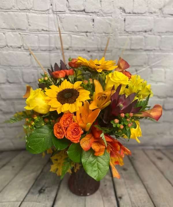 FALL HAPPINESS FALL HAPPINESS - What would make her more happy than a beautiful fall bouquet! This gathering vase is full of sunflowers, lilies and roses, berries, spray roses and fun cattails.