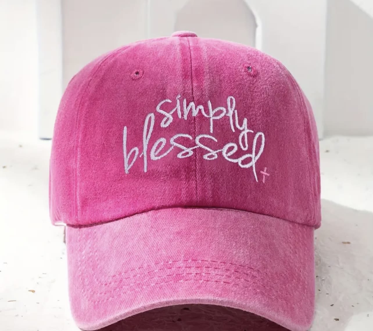 Simply Blessed Cross Cap - Bright, cheerful, and inspiring, this hot pink cap declares “Simply Blessed” in modern script with a subtle cross detail. It’s a joyful way to share your faith while adding a pop of color to any outfit. Perfect for daily wear, faith gatherings, or as a meaningful gift.