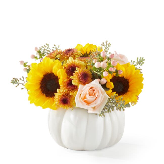 Pumpkin To Talk About Bouquet (FTD) - Give them something to talk about! This darling white ceramic pumpkin has gorgeous pink roses and vibrant sunflowers, making it the perfect focal point of any autumn celebration! Approximately 11 inches wide and 8 inches tall for the Standard size.