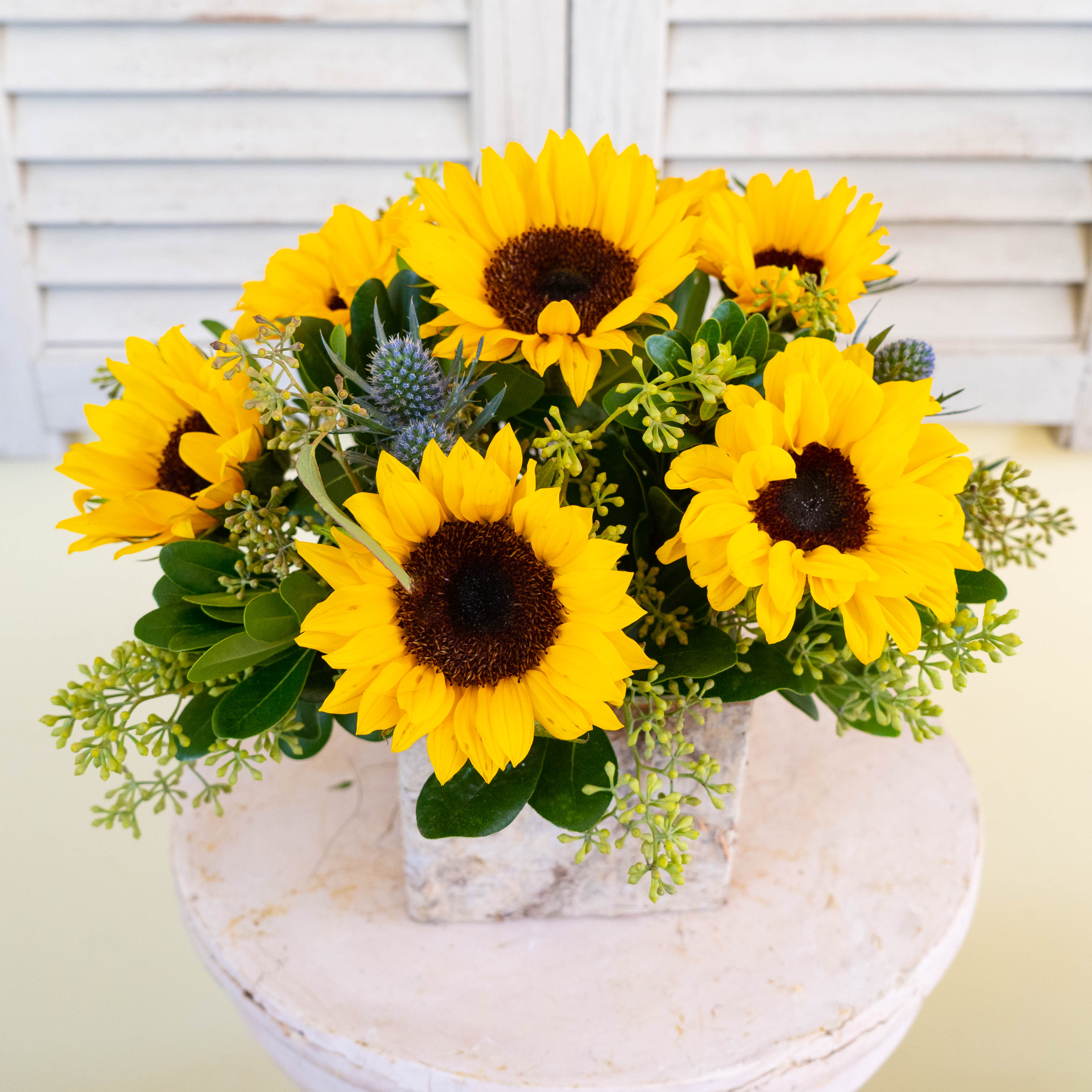Bee Happy - A cheerful arrangement of fresh, vibrant sunflowers perfect to make anyone's day!