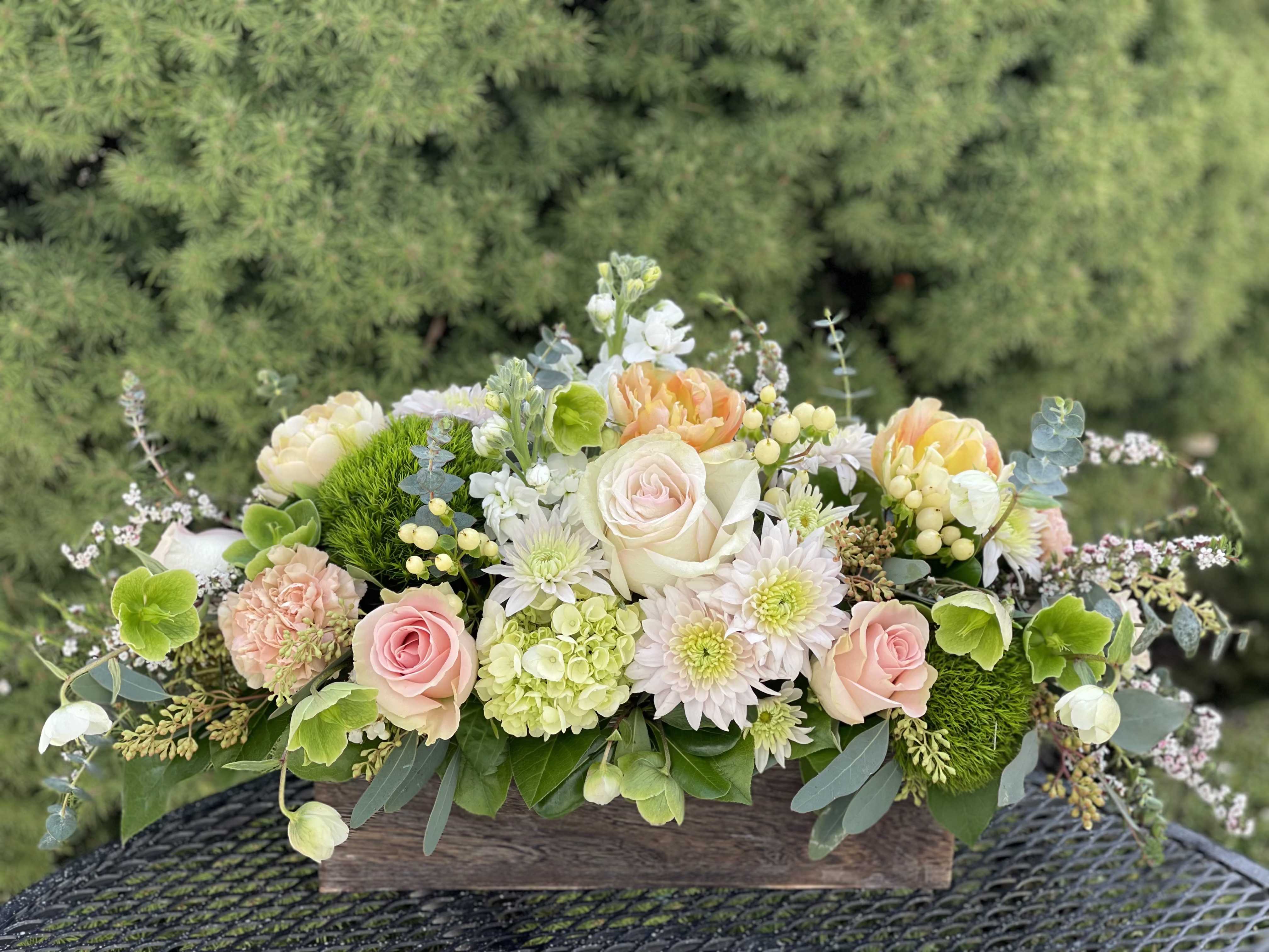 Tea Time - A gentle garden palette featuring hellebore and heather, stock, roses, and hypericum berries presented in a rustic wooden box. The perfect centerpiece for your next garden tea party or a soothing embrace for a grieving friend. 