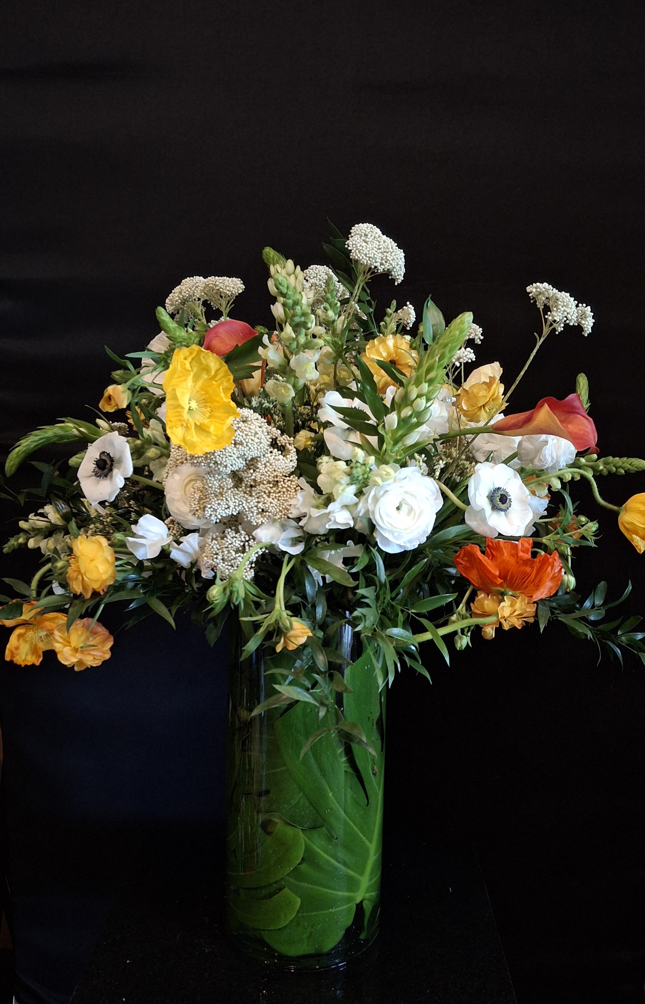 Graceful and Grand - This beautiful arrangement features some of the most delicate and unique flowers.It is both sweet and bold, making a grand statement with a timeless traditional touch.