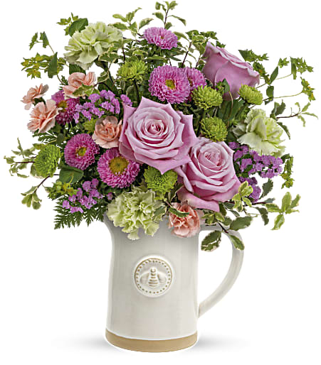 Teleflora's Artisanal Pitcher Bouquet - Pour on the happiness! Mother's Day feels extra special when a beautiful rose bouquet is delivered in this artisanal glazed stoneware pitcher with charming sculpted bee detail. Food safe, it's sure to be a kitchen favorite for many years to come! 