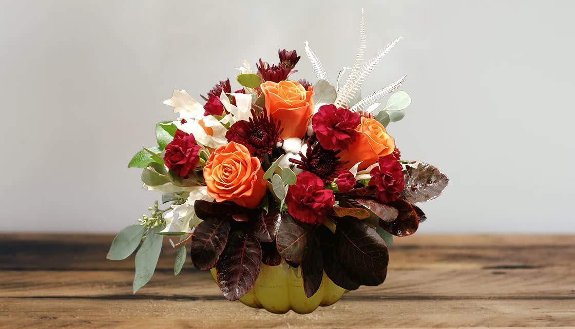 Yellow Pumpkin - ABM Floral Studio's signature medium modern pumpkin table centerpiece to decorate your home or office for the Halloween and Thanksgiving holidays.