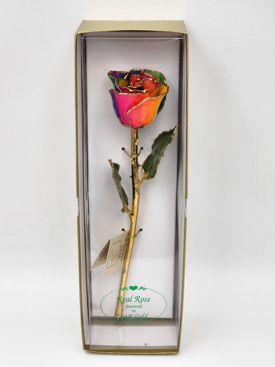 Preserved Rainbow 24KT Gold Rose Preserved Rainbow 24KT Gold Rose - A real rose preserved to last and then trimmed with real 24kt gold and presented in a gift box.