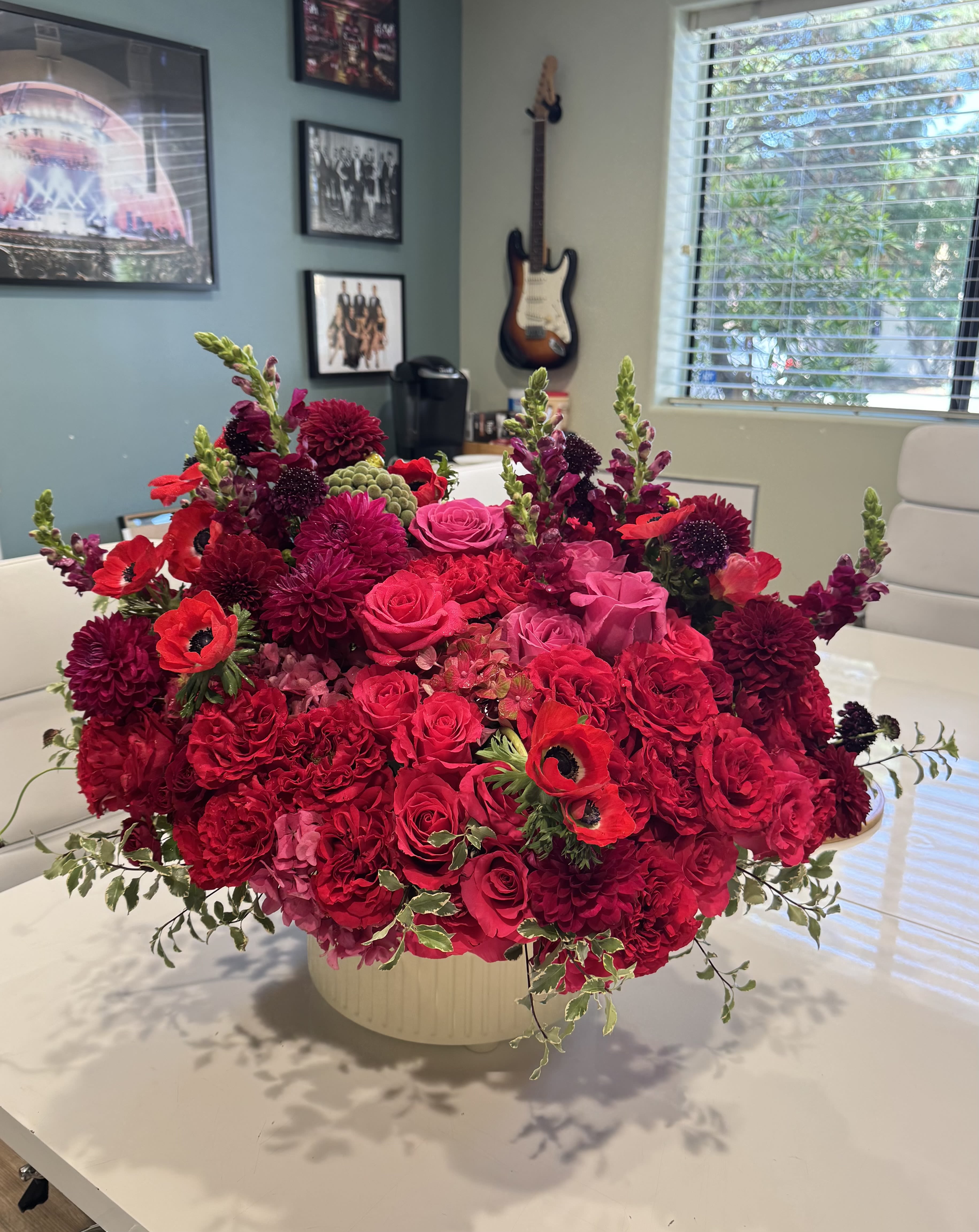 Bright Reds - Red and hot pink colorful flowers gorgeously designed in a nice vase
