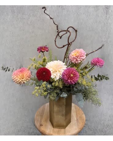 Dahlia Delight - Dahlia's are a gorgeous flower, this arrangement will highlight their beauty with a variety of colors.