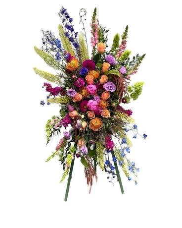 Designers Choice Standing Spray - This Standing Spray is just a beautiful example of what our designers can do with a little freedom. You may request certain colors or flowers to be used in the special instruction box during check out. Picture is of a premium spray. Flowers used will differ from picture.