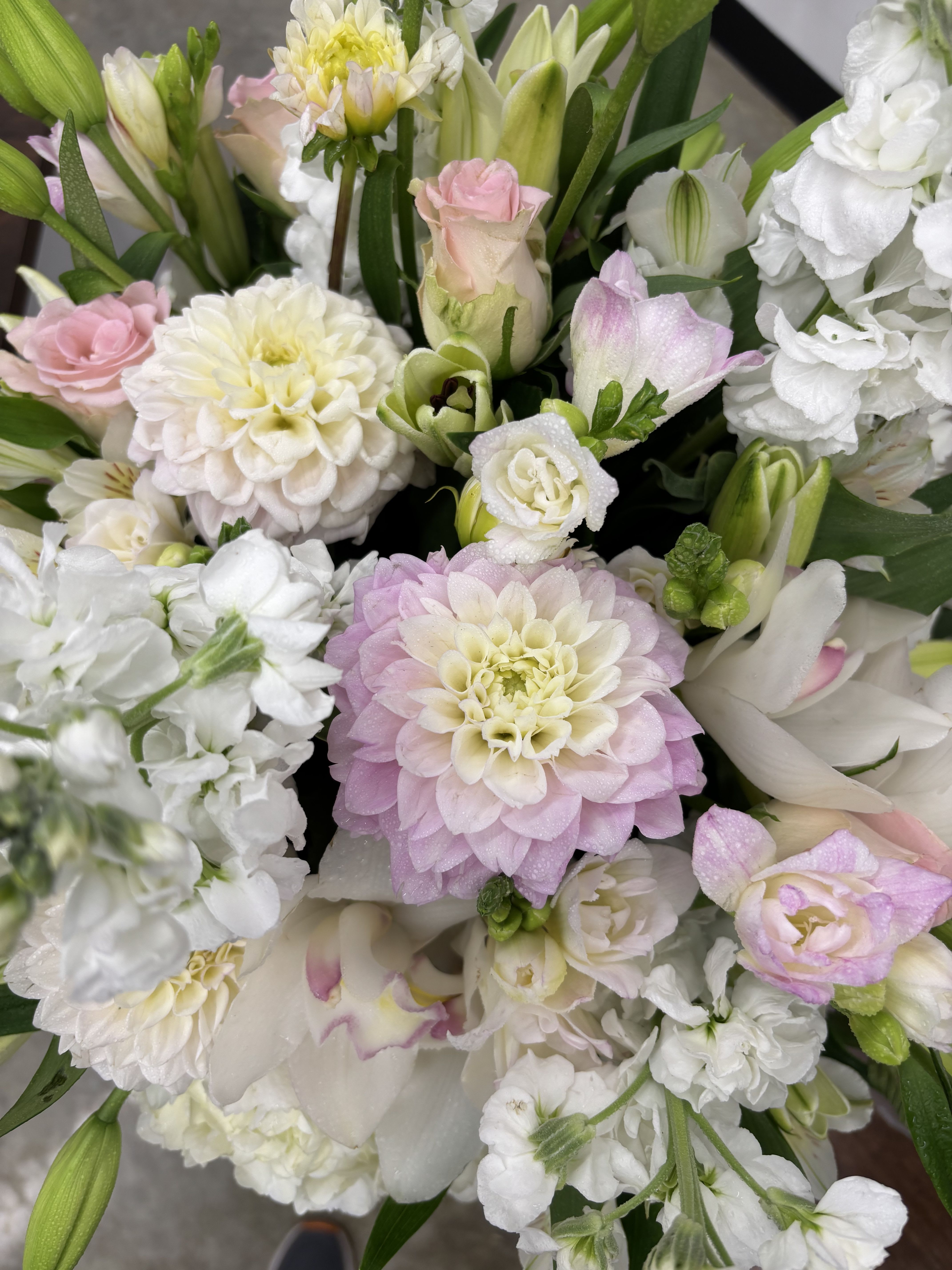 Montclair Flowers and Gifts Floral Workshops (Start Time 6:00PM on Select Saturdays) - Private classes are 2 hours long and all events are at our Lackawanna Station location, and we provide you a personal instructor, all the tools and materials to learn how to make one of our signature arrangements with your own personal touch! Enjoy an amazing evening among friends and take your beautiful arrangement home to share with loved ones. Will be done on select Saturdays throughout the year. Reservations are now being accepted for the following dates in 2025:  October 25, 2025 November 15, 2025 December 13, 2025 (Note: Dates Subject To Change Based on Availability)  Space is limited so register today before we are sold out. Add guests on edit items tab on following page.  BYO Event (Food and Drink) Cost Per Person - $90.00  We are a BYOB facility, so guests may bring their snacks and drinks of choice! Guests Must Be 21 or Older.   The design-instructor, supplies, flowers and materials, are provided by Montclair Flowers and Gifts. Keep food light and simple (ex. light snacks, appetizers or hors d’oeuvres), as you will be designing (and socializing) the majority of your time during your event.  We will begin designing at the time scheduled, so we request that all guests begin to arrive 10 minutes before the confirmed time of event. We are unable to extend the time of your event due to delays. It is important for everyone to arrive in a timely manner so they stay on task with all the steps in the design of their floral arrangement.