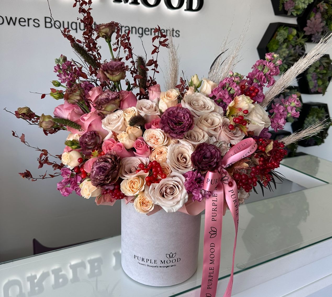 Fall Collection Box - Standard container size - D6.75'x H7.5'  Deluxe container size - D8.25'x H9.5'  Fall Collection Box Capture the beauty of autumn with this rich and elegant arrangement. Featuring a warm palette of deep reds, soft creams, and seasonal textures, this bouquet brings the cozy charm of fall indoors. Perfect for gifting or decorating, it’s a striking piece that celebrates the season in style.      •    Elegant design inspired by autumn’s natural beauty     •    Full, textured arrangement with a warm seasonal palette     •    Available in Standard and Deluxe sizes     •    Perfect for fall celebrations, Thanksgiving tables, or thoughtful gifts