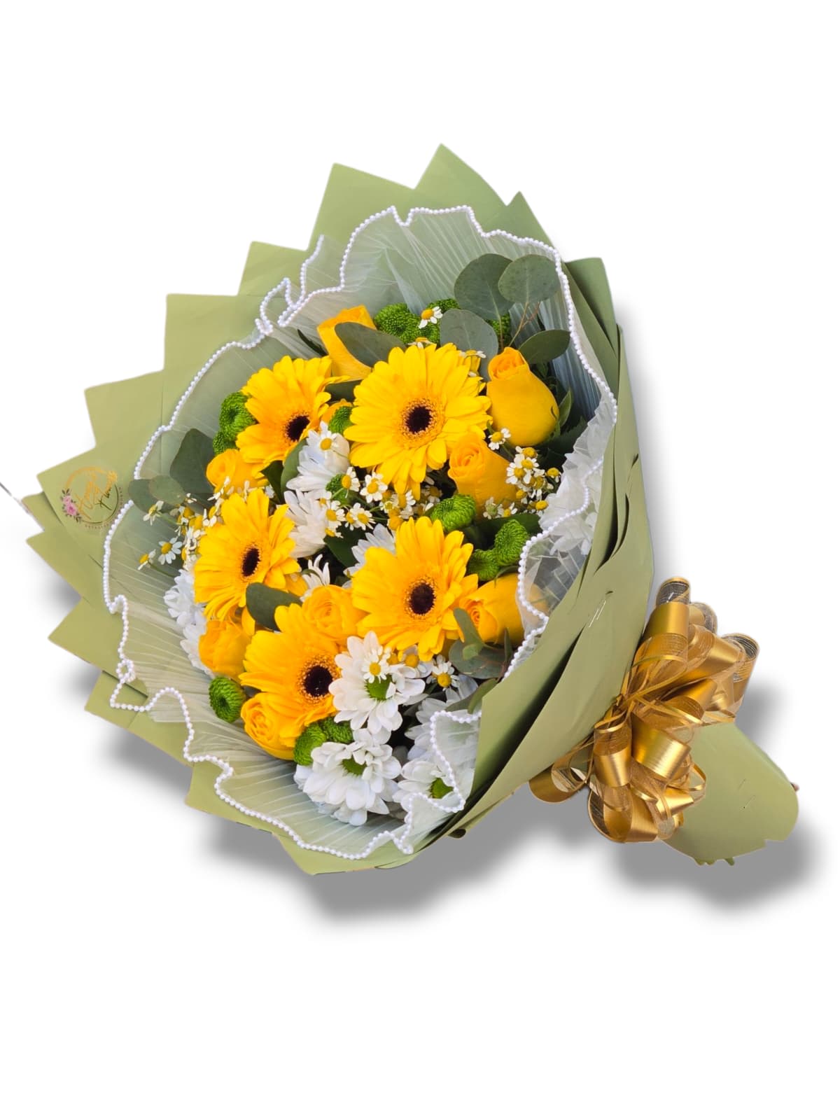 SUNNY CHARM - Delight in the vibrant mix of yellow gerberas, yellow roses, white mini daisies, green button poms, and lush green foliage.