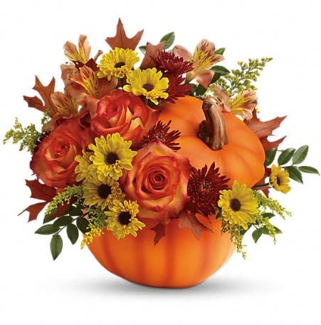 Warm Fall Wishes - Everyone falls for this fabulous fall gift! Celebrate the season with this autumn arrangement of roses and alstroemeria, arranged in a classic ceramic pumpkin they'll use year after year!