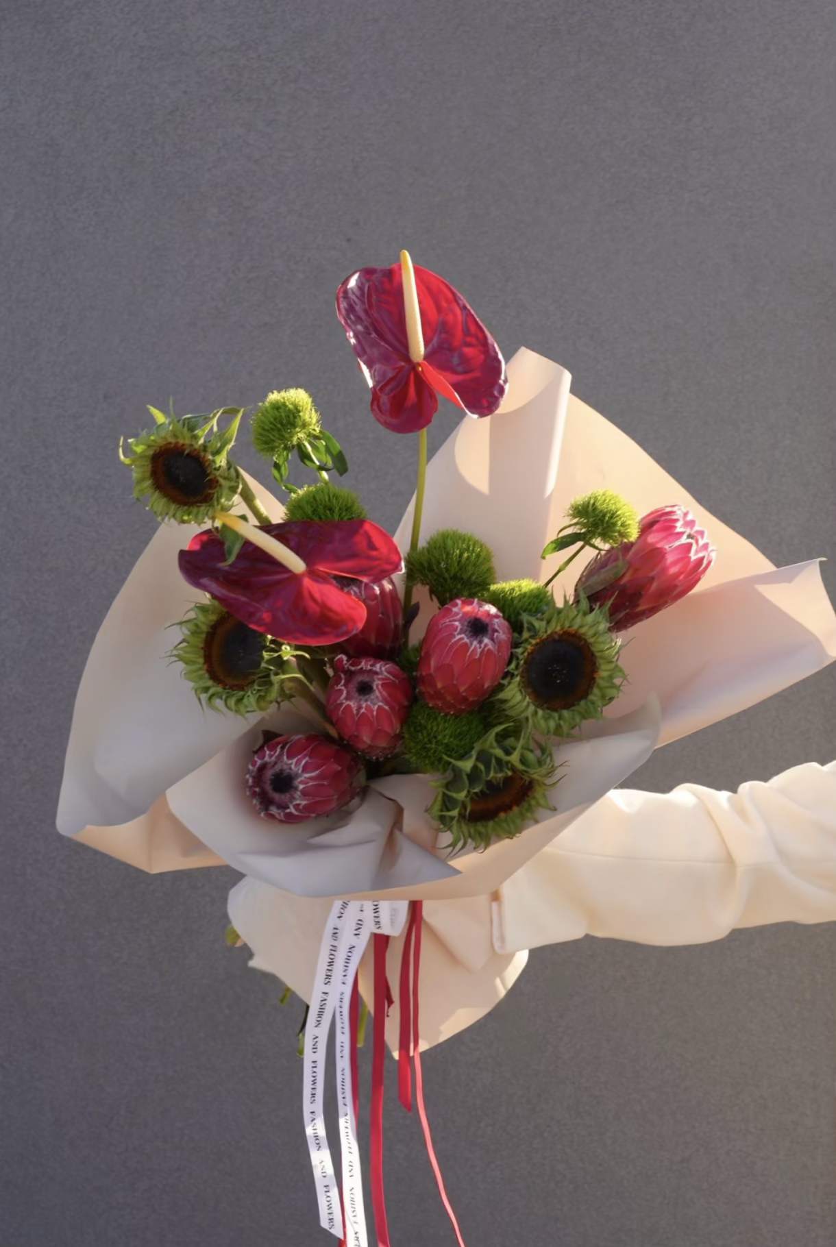 Avant-Bloom - A bouquet that redefines floral design. With sculptural anthuriums, daring textures, and unexpected contrasts, it embodies the spirit of avant-garde — bold, fearless, and unapologetically modern.