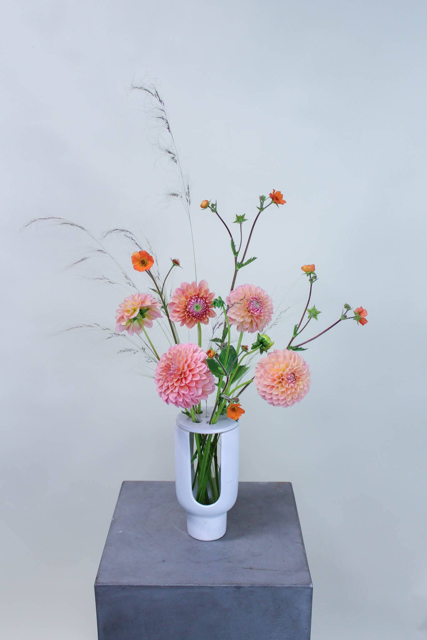 Ikebana bud vase - A splash of our favorite blooms of the week to highlight this all season bud vase.  *Images are a representation of our design style. Each arrangement is unique and made to order the day of your order. 