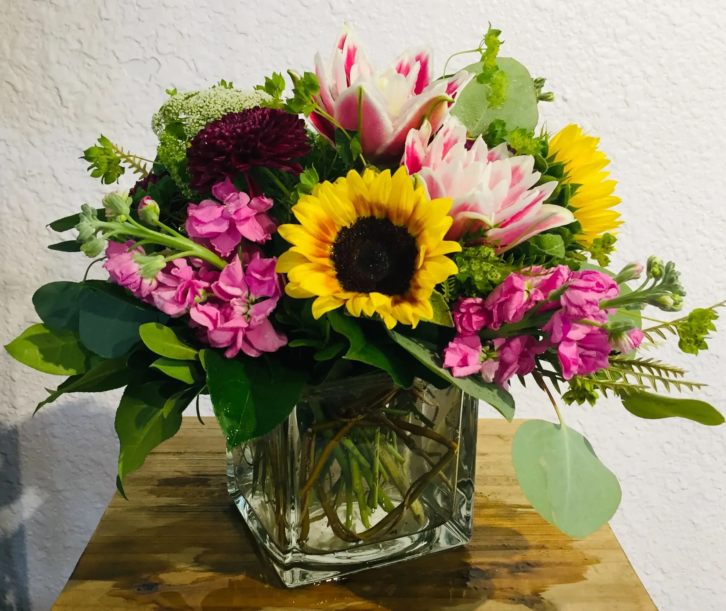 Sunny! - Sunflowers, stock and rose lilies will brighten any day!  Perfect for any occasion.  