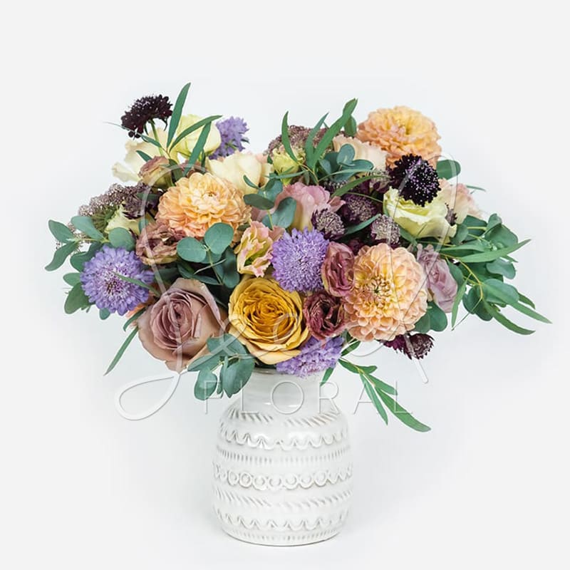 Fall Into Spring - Missing the warm weather, blooming trees, and sunshine? Fall into spring with this full sided moody and pastel color palette of premium florals. Featured in Textured Ceramic Indie vase 6&quot; x 8.5&quot; x 2.75&quot;
