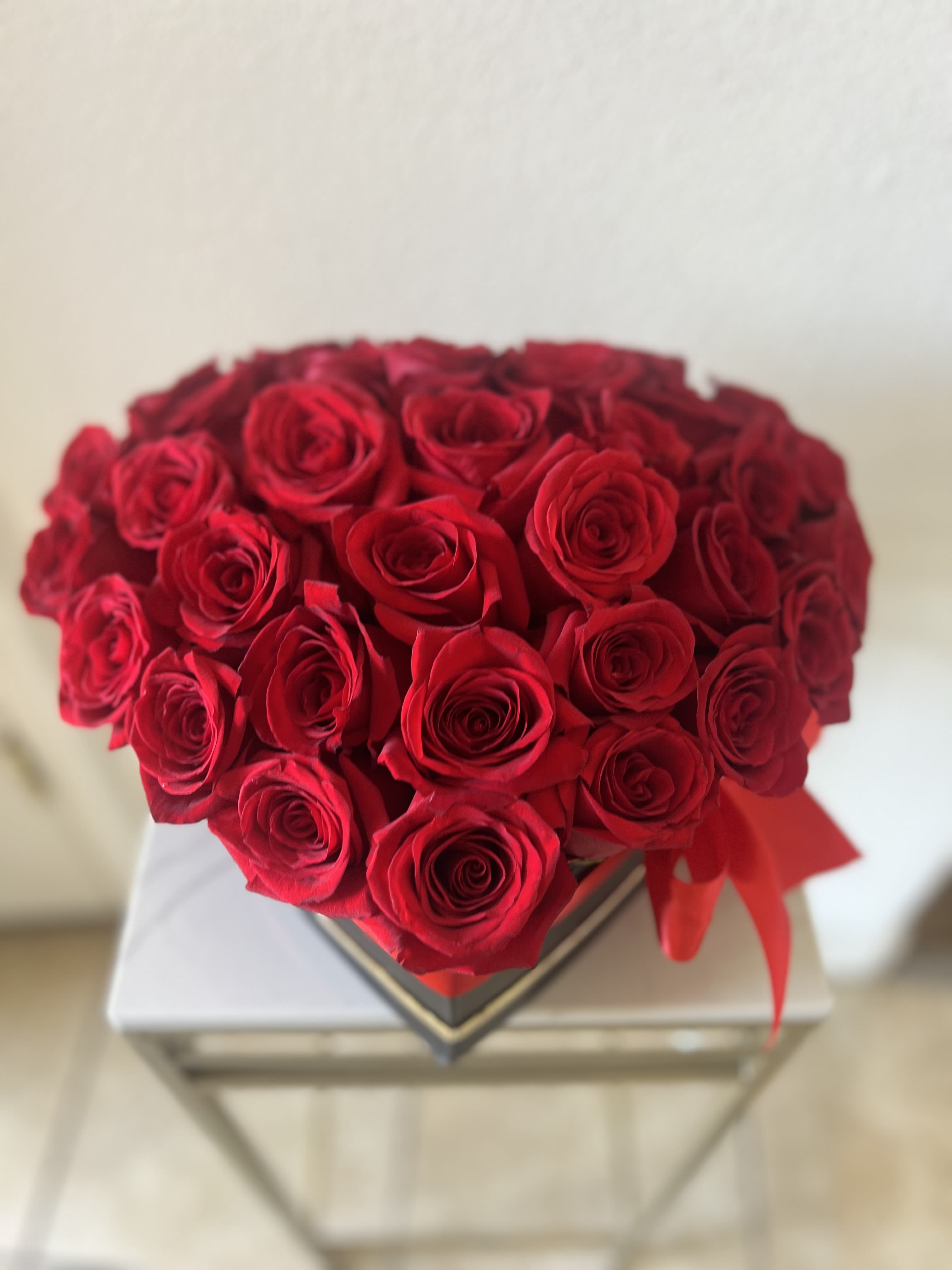 Premium heart shaped box  - A “Heart Box with Roses” is a romantic floral arrangement where fresh roses are carefully placed inside a heart-shaped box. ️ These are popular for occasions like Valentine’s Day, anniversaries, Birthdays or simply expressing love