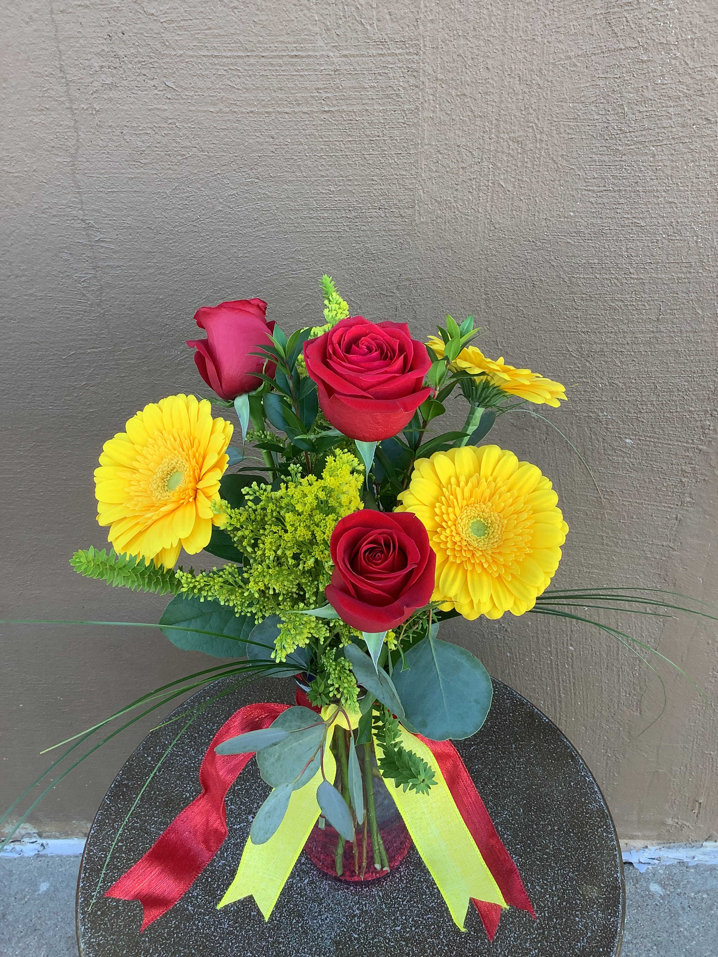 You are my Champion - This arrangement of red roses and yellow gerbera daisies is in honor of the Kansas City Chiefs Super Bowl win! Let you Valentine know she is the Champion of your Heart!