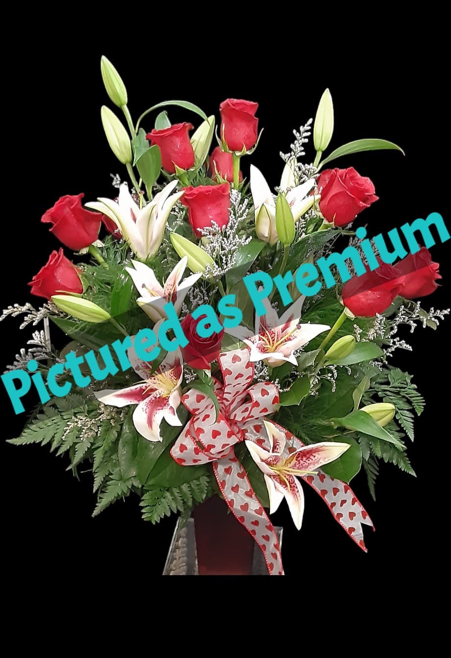 LOVE and STARGAZING - LOVE and STARGAZING is a perfect tribute to passion and prosperity of love and relationships. However, the symbolism in this bouquet are second to its beauty.  *Pink Lilies symbolize prosperity and abundance. *Red Roses symbolize romance and passion  Standard: 6 Red Roses and 6 Pink Lilies hand-crafted to order, with an accent flower and greenery in a vase.  Premium: 12 Red Roses and 6 Lilies hand-crafted to order, with an accent flower, and greenery in a vase. (PICTURED AS A PREMIUM BOUQUET) Accent Flowers May Include one or more of the following: Babies Breath, Limonium, or Caspia. 