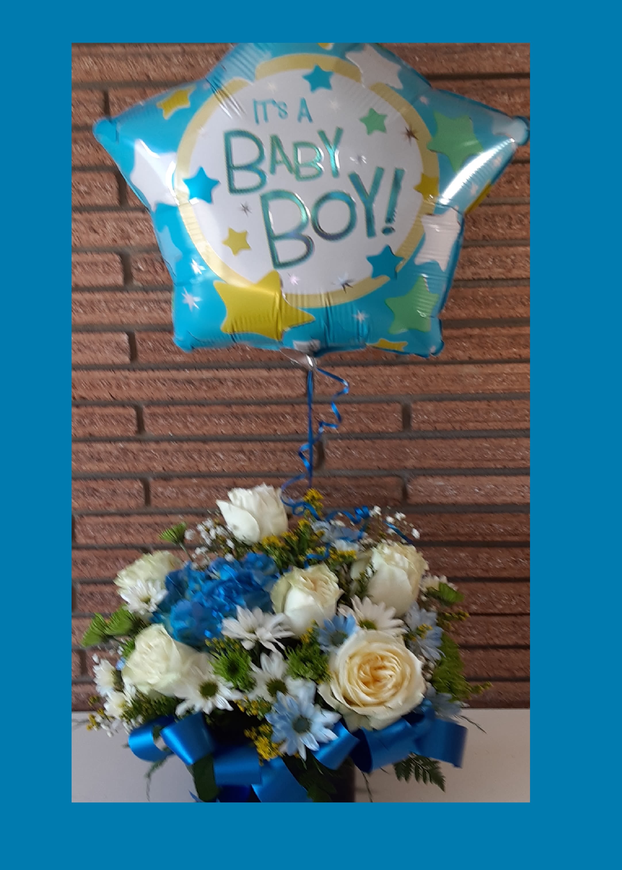 WELCOME BABY BOUQUET in a CUBE and BALLOON!! (BALLOON INCUDED) - Please specify BOY or GIRL in the special instructions in checkout! Girl- Will have some pink and other accent flowers. Boy- Will have some blue and other accent flowers.   STANDARD BABY BOY/GIRL arrives in a pink/blue ceramic cube. The DELUXE and PREMIUM BABY BOY/GIRL arrive in a larger container or a wooden box. 