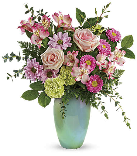 Teleflora's Enamored With Aqua Bouquet - Sweet and stylish, this blushing mix of soft pink roses with bright pink accents finds a fresh counterpart in this stunning aqua-glazed ceramic vase with shimmering iridescent finish. 