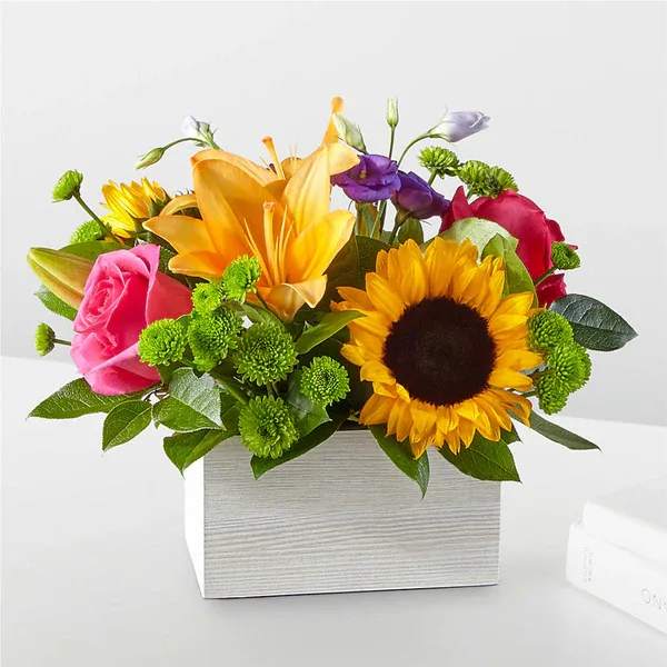 Best Day Box Bouquet - Who knew their best day could be delivered in a box? We did, with the help of a local florist to handcraft one of the most popular bouquets celebrating any occasion.  Bloom Details Lily Rose Snapdragon Sunflower
