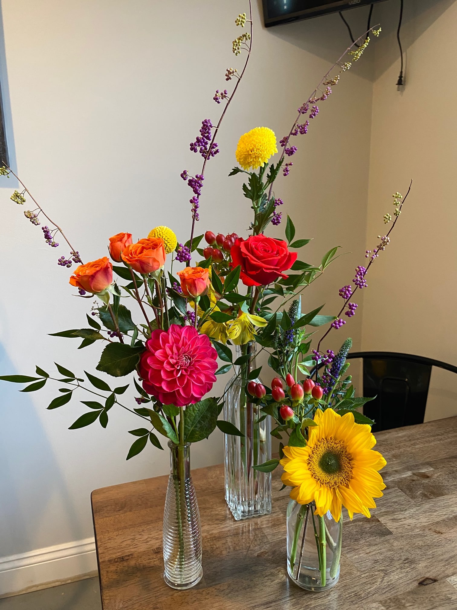 Vintage Wildflower Bud Vases - Why send one arrangement when you can send 3? Or 5? The bud vases are great for placing all around the home. Varieties and color of flowers may vary according to availability and flower artists' taste of the moment, so every time a different &quot;work of art&quot; will be made of what we think looks best and is the freshest. Designer's choice arrangements are made with the best and freshest product in our current inventory, which is always changing. The photos provided are to give you an idea of our style.  