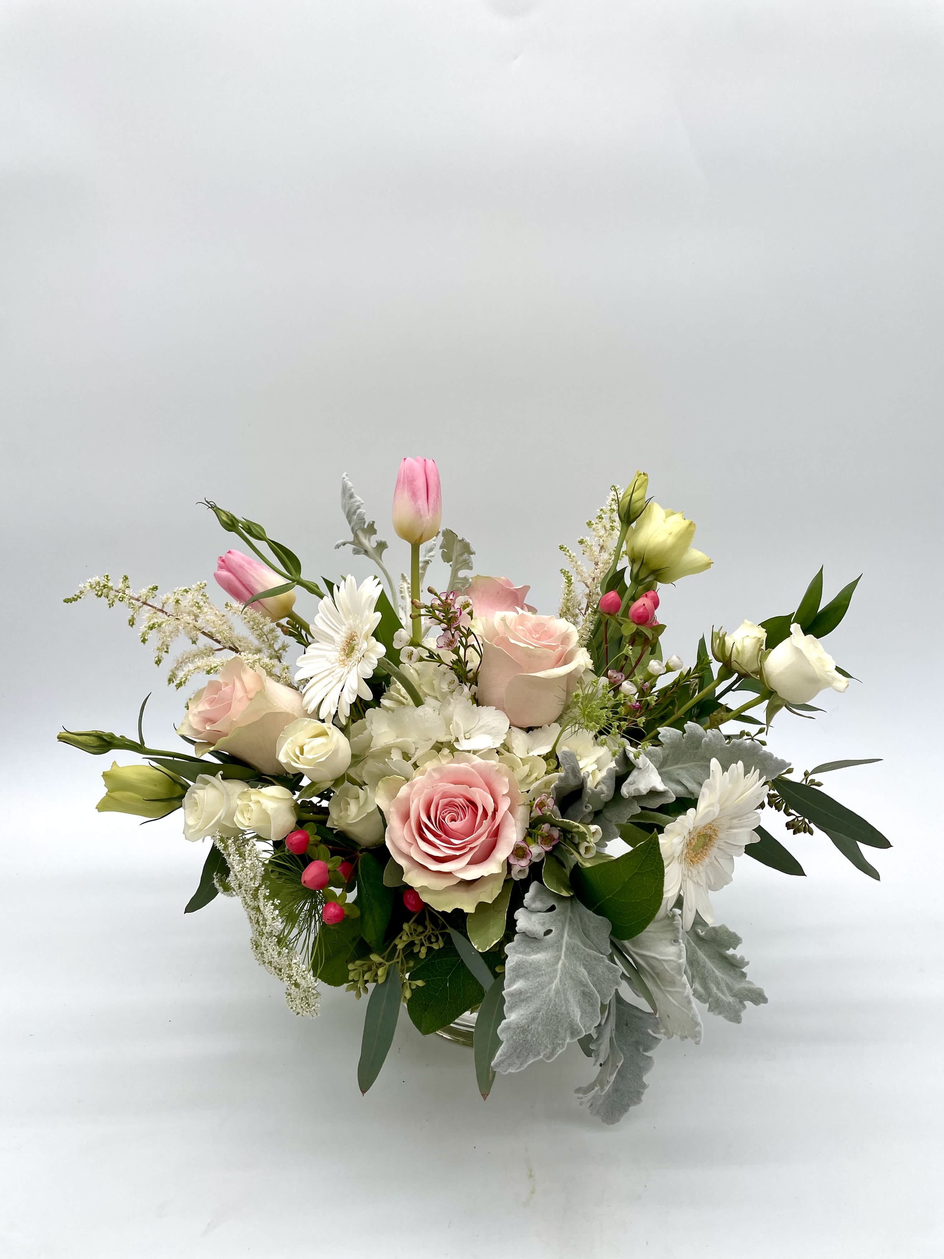 Pretty in Pastel 2.0 Pretty in Pastel 2.0 - Low and lush, soft pastel arrangement in a 5 x 5 vase with a whimsical, garden-style look. Mainly pink and white. Designers may need to implement substitutions, however will follow the general arrangement style and color theme. Standard price point is pictured.