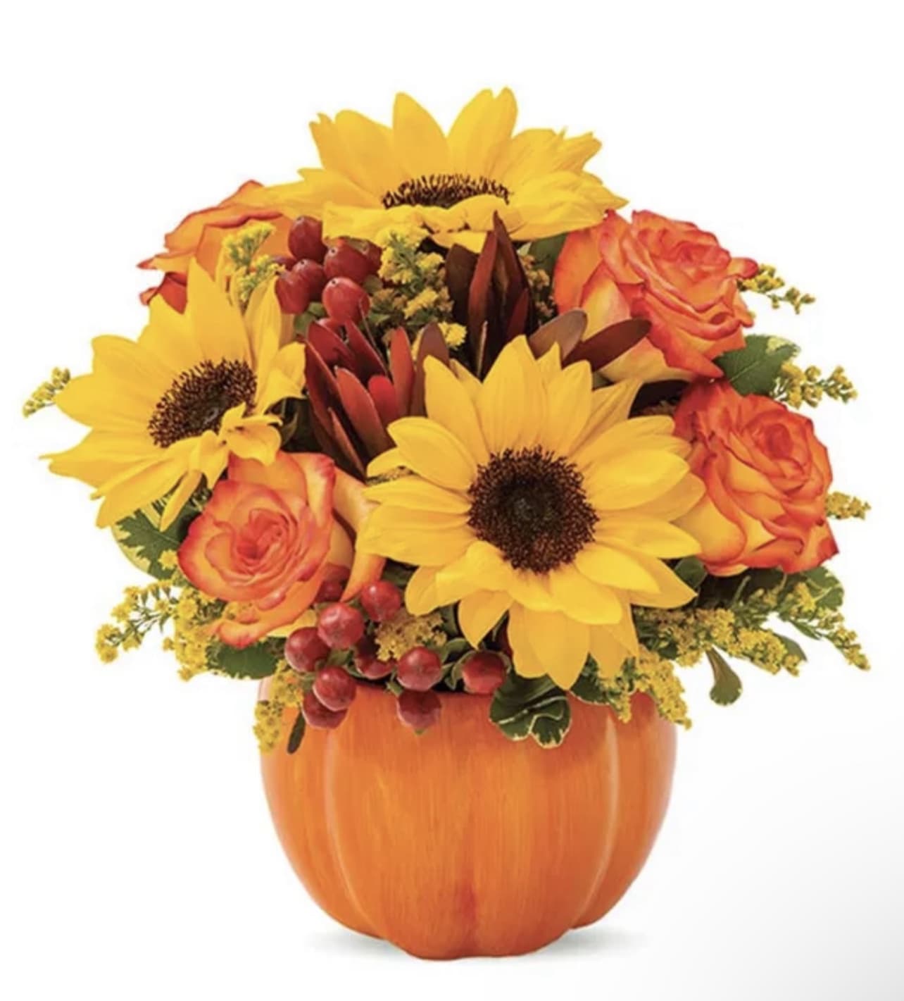 Sunny Fall Pumpkin - Invite the joy of the season into your home with bright and cheerful fall sunflowers bursting out of an adorable decorative pumpkin container. This charming beauty wouldn't be complete without fragrant fall roses and a tropical safari sunset accent. This unique Sunny Fall Pumpkin garden is the perfect pick-me-up for a friend or loved one in need of a smile.   PLEASE NOTE: Florist reserves the right to make modifications to the design based on seasonality and accessibility of blooms and vases. Any modifications made will honor the palette, intent, and feeling of the pictured design. Contact floral designer directly with any specifications or concerns.