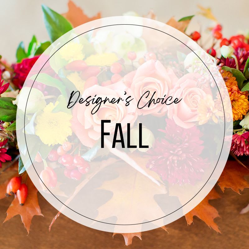 A Fall Handheld Bouquet A Fall Handheld Bouquet - Our designers will use the best seasonal flowers in this color scheme. Available in different sizes.