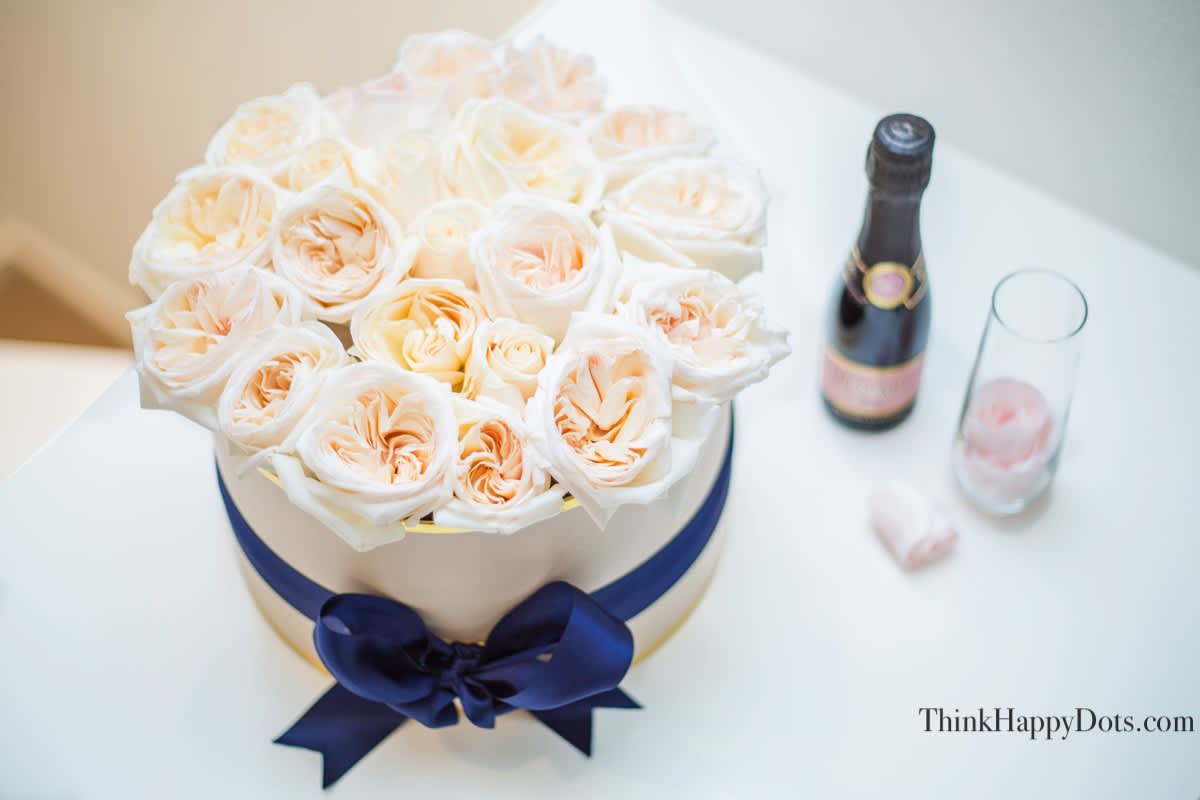 Hollywood Love Story - Make Her Heart Melt time &amp; time again. Inspired by Classic love stories, OLD Hollywood, and an era where the perfect rose explained it all. Created to capture timeless elegance.   We hand select over a dozen of the most premium garden roses, and delicately arrange them in a hat box that would make anyone blush.