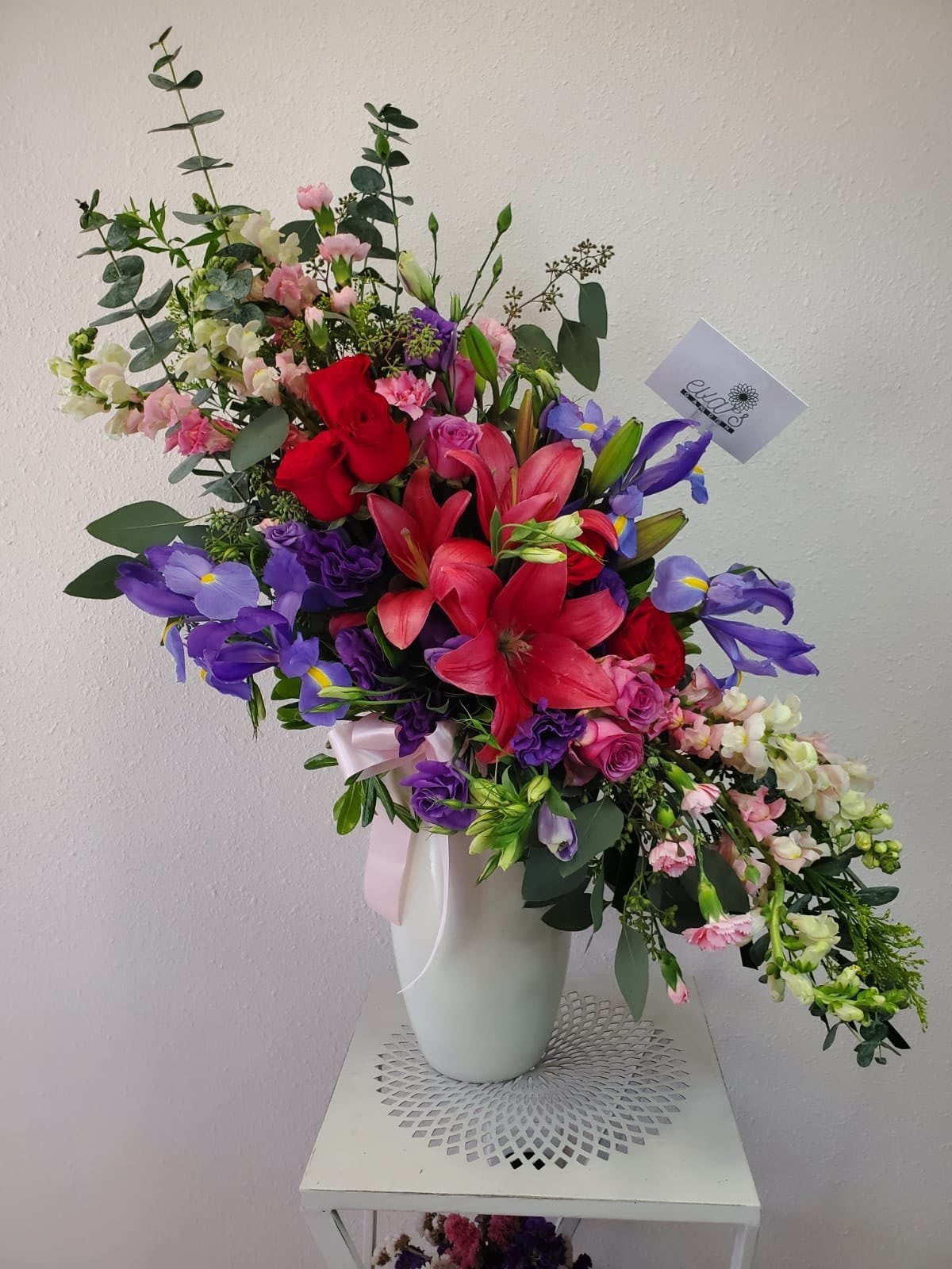 Stupendous Vase Arrangement - Designer arrangement that makes an elegant and unique statement with lilies, roses, irises, snapdragons, carnations, and lisianthus.   (Picture depicts a standard product; deluxe &amp; premium size available upon request)