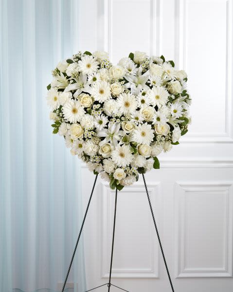 All White Heart Wreath All White Heart Wreath - Heart shaped wreath with all white flowers. Substitutions may occur according to season.