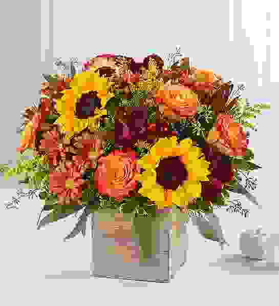 Fall Sunset - Sunflower, orange roses, and alstromeria, just in time for fall.