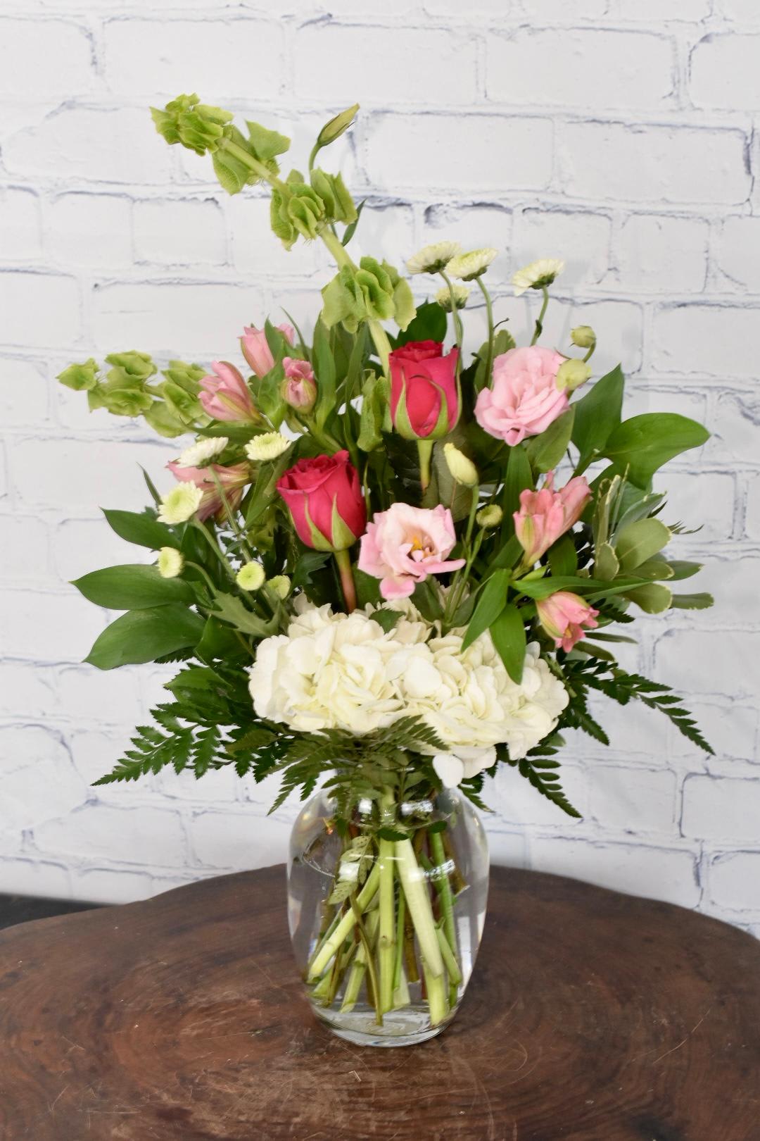 Pretty In Pink - Our Pretty In Pink Valentine's arrangement is filled with beautiful pink and white flowers perfect for the sweet love of your life. 